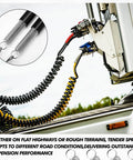 4 Pack 16 Inch Dual Trailer Spring Kit With Heavy Duty Tension Springs installed on semi truck, holding ABS air lines and cords
