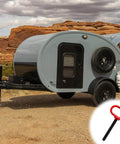 2 Pack Heavy Duty One Half Inch by Four Inch Trailer Hitch Pin and Clip for Tractor RV Truck Boat Car with Red Handle shown next to a camper trailer in a desert setting