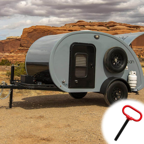 2 Pack Heavy Duty One Half Inch by Four Inch Trailer Hitch Pin and Clip for Tractor RV Truck Boat Car with Red Handle shown next to a camper trailer in a desert setting