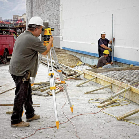 20x Builder's Transit Level Kit with Tripod and Rod in use at construction site for precise surveying with 200+ ft range