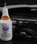 Transmission Fix 24 Ounce Add To Existing Automatic Transmission Fluid Stops Slips Hesitation Rough Shifting Bottle on Engine Bay