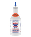 24 oz bottle of Lucas Transmission Fix with label detailing its use to stop slips and hard shifting in automatic transmissions.
