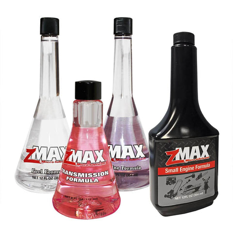Assorted ZMAX bottles including Transmission Formula For Automatic And Manual Transmissions, 6 oz, showcased with other car additives.