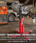 Beefy 1000 Lb Air And Hydraulic Telescoping Transmission Jack With Adjustable Saddle Arms, 35.5 In To 73.5 In Lift Range, Model 7796 For Transmissions, Transaxles And Transfer Cases In The Shop displayed in a mechanic shop with a transmission mounted.
