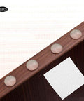 Self Adhesive Anti Slip Silicone Bumpers 200 Pcs Transparent Foot Pads for Furniture displayed on wooden surface