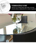 Glass table with a suction cup for versatile use, featuring part of a text describing the benefits of the suction cup for multiple surfaces.