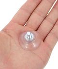10 Pack Transparent Suction Cups With M6 Screws Nuts in hand, showing size and clear PVC material for versatile use on smooth surfaces.