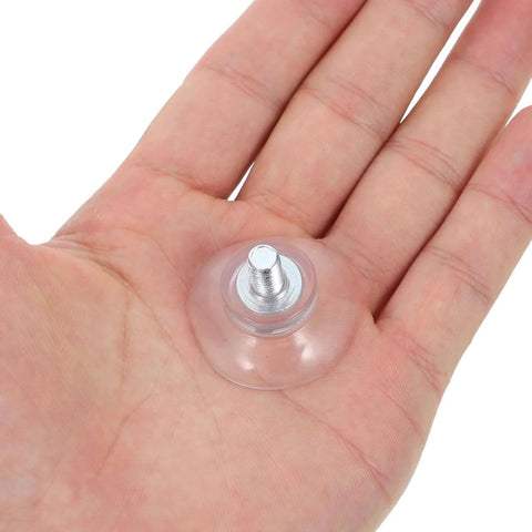 10 Pack Transparent Suction Cups With M6 Screws Nuts in hand, showing size and clear PVC material for versatile use on smooth surfaces.