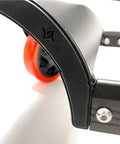 Close-up of Trax Wheels 2.0 Rear Wheel Casters for Snowmobiles and Snow Bikes showing oversized red wheel, heavy duty construction.