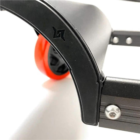 Close-up of Trax Wheels 2.0 Rear Wheel Casters for Snowmobiles and Snow Bikes showing oversized red wheel, heavy duty construction.