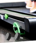 Close-up of treadmill with Four Piece Adjustable Treadmill Feet Mounting Hardware With Thumb Screws For Exercise Machines on floor