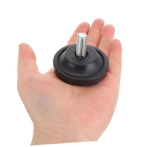 Person holding a slip resistant treadmill leveling pad with mounting screw, part of a two pack for stable fitness equipment on uneven floors.
