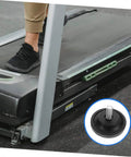 Two Pack Slip Resistant Treadmill Leveling Pads With Mounting Screws for stable fitness equipment on uneven floors, black pad, treadmill foot visible