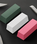 Triple bar metal polishing kit with 4 oz total, featuring green, white, and red compounds for leather strops and buffing wheels.