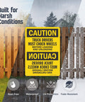 Truck Drivers Must Chock Wheels Before Loading And Unloading Sign 10 x 14 Aluminum Safety Sign in outdoor setting