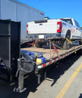 Pickup truck secured on trailer with ✝️ 3/8 Inch x 6 FT Grade 70 Binder Chain with Clevis Grab Hooks - G70 Transport Tow Chain - 6,600 Lbs