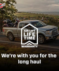 Premium air spring kit delivers up to 7500 lbs leveling, adjustable 5 to 100 psi, installed on truck with lifetime warranty badge