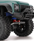 Close-up of installed 25T Servo Horn Upgrade For 1/18 TRX4M, featuring black and red anodized CNC aluminum with etched logo and durable metal build.