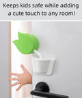 Tulip Shaped Extra Thick Foam Door Pinch Guard And Baby Proof Stopper installed on white door preventing finger pinches