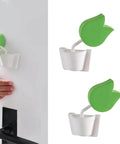Tulip Shaped Extra Thick Foam Door Pinch Guard And Baby Proof Stopper 2 Pack No More Finger Pinches Or Door Slams Keeps Kids And Pets Safe At Home Today, installed on door, green and white foam.