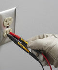 Twistguard Test Leads, 2 mm Diameter Probe Tips in use with an electrical outlet, showcasing rugged extendable design for safe measurements.