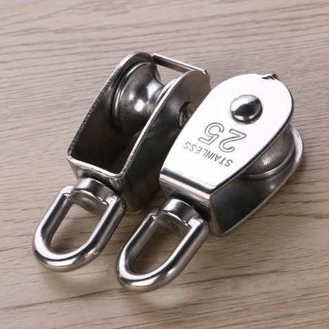 Two Pack 25mm 304 stainless steel pulley blocks with a 400 kg rating deliver reliable lifting, shown on a wooden surface