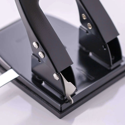 Close-up of Two Hole Paper Punch 30 Sheet Capacity Black with adjustable guide and easy chip tray, ideal for office and school use.