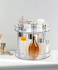 Two Tier Clear Lazy Susan Turntable Organizer With 360 Degree Rotation For Vanity And Bathroom Storage holding toiletries