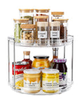 Two Tier Lazy Susan Organizer For Narrow Cabinets And Countertops, with spice jars on the top tier, cans and sauces on the bottom tier.
