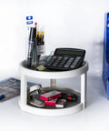Two Tier Rotating Lazy Susan Organizer with non skid base holding office supplies, calculator, and stationery items, 10 inch spinning unit