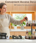 Two Tier Rotating Lazy Susan Turntable Organizer for Kitchen and Pantry shown with spices and jars in modern kitchen setting.
