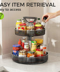 Two Tier Rotating Spice Rack Turntable For Kitchen Cabinet Pantry And Countertop with jars and bottles, on a kitchen counter