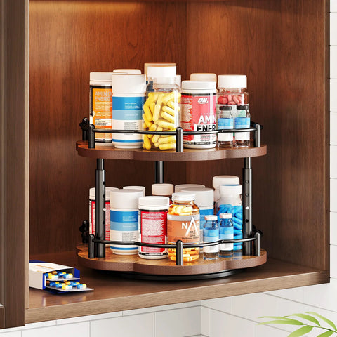 Two Tier Wood Lazy Susan Spice Rack Organizer with 360 Degree Rotating Turntable holding jars in a cabinet