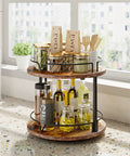 12 Inch Wood Lazy Susan Two Tier Rotating Spice Rack Turntable Organizer on kitchen countertop, holding spices and condiments, rustic brown.