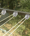 U Groove Pulley Block 2", 304 Stainless Steel Pulley Roller installed on metal beam for wire rope traction, outdoor view