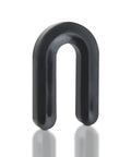 Close-up view of single black horseshoe spacer from 200 Pieces One Quarter Inch Horseshoe Tile Spacers U Shape Plastic Shims Structural Reusable Durable Set For Grout Lines And Lippage Control Ideal For Floor And Wall Tiling Easy To Clean And Reuse.