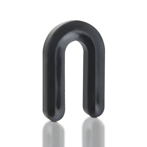 Close-up view of single black horseshoe spacer from 200 Pieces One Quarter Inch Horseshoe Tile Spacers U Shape Plastic Shims Structural Reusable Durable Set For Grout Lines And Lippage Control Ideal For Floor And Wall Tiling Easy To Clean And Reuse.