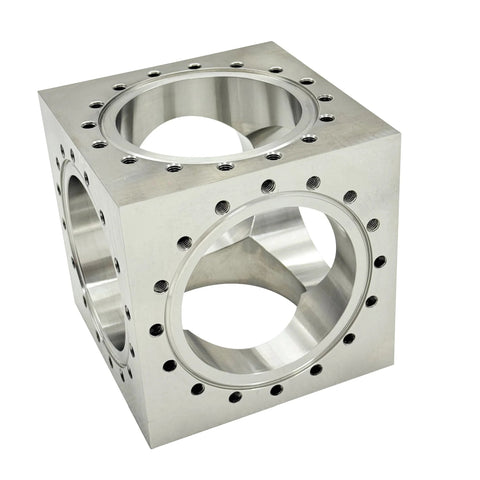 Six Channel UHV Cube Flange in 304 stainless steel with 101.6mm bore and sixteen M8 bolt holes for complex vacuum chamber layouts.