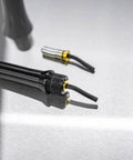 Close-up of Ultra Air Blaster Bearing Kit 2 Pack for Version 2 showing tool attachments on a reflective surface