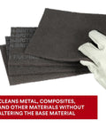 Gloved hand holding Ultra Fine Hand Pad 6 X 9 Inch Nonwoven Silicon Carbide for Surface Prep and metal finishing