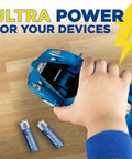 Child's hand placing 24 Pack AAA Alkaline Batteries Ultra Long Lasting For Home And Office Use into toy car on wooden surface