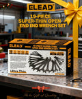 Box of Ultra Slim 19 Piece Open End Wrench Set With Roll Up Pouch on a workbench, featuring 3 mm ultra-thin profile for tight spaces.