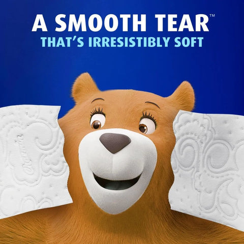 Bear holding Ultra Soft Toilet Paper Mega Roll Pack With Six Mega Rolls Equaling 24 Regular Rolls, highlighting soft texture.