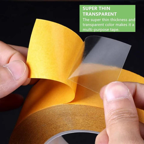 Ultra Thin Clear Double Sided Mounting Tape Heavy Duty 2 Inch By 82 Feet shown peeled from yellow backing, focus on transparency.