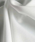 Ultrasonic Sealed Edge Cleanroom Wiper For Sensitive Surfaces 9 Inch By 9 Inch Polyester Knit shown in close-up texture view