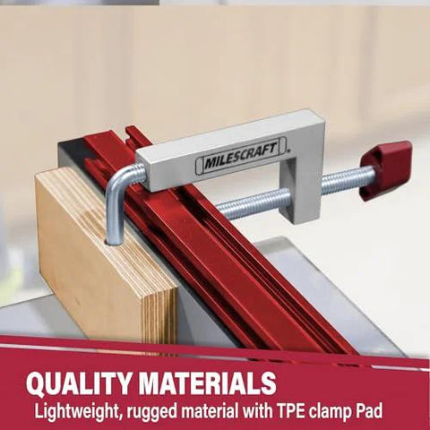 Universal Fence Clamps For Table Saws And Router Tables 2 Pack With Three Eighths Inch Rod securing wood on Milescraft 4009