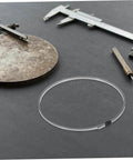 Sealing Machine Heating Wire Strip Replacement Heat Sealer Elements with tools on dark surface