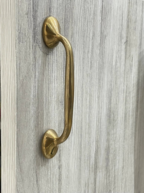 Richmond Unlacquered Brass Cabinet Pulls And Solid Brass Drawer Handles For Kitchen Cabinets And Furniture, installed on wood surface