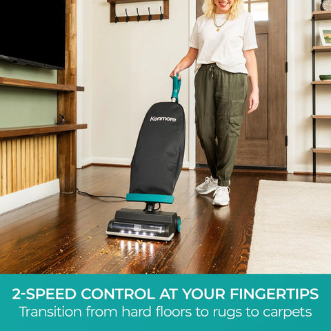 Person using Powerful Commercial Upright Vacuum Cleaner with 14 Liter Bagged Capacity, LED Headlight on hardwood floor.