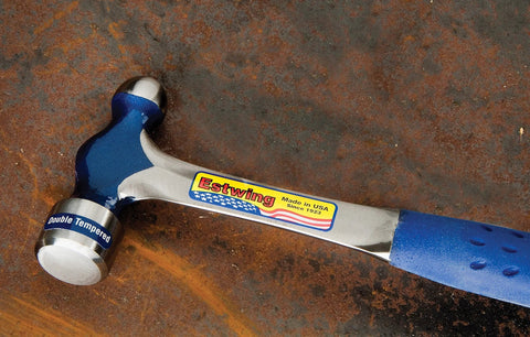 Ball Peen Hammer 24 Oz USA Made With Forged Steel Construction And Shock Reduction Grip for metalworking and auto body projects on table